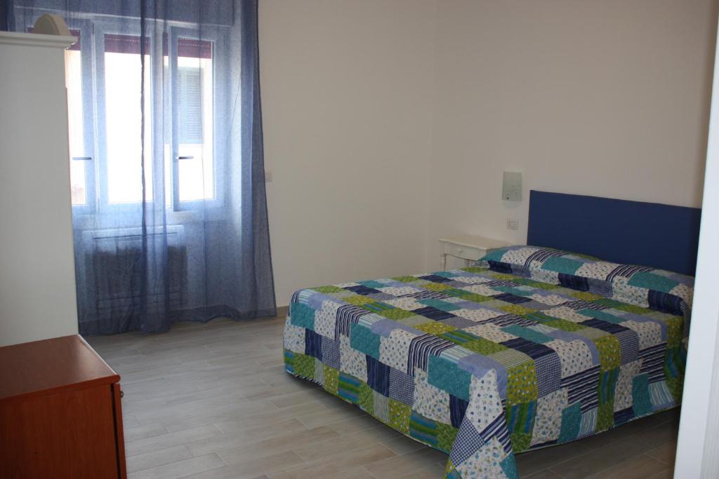 Postel nebo postele na pokoji v ubytování Casa Nova b&b
