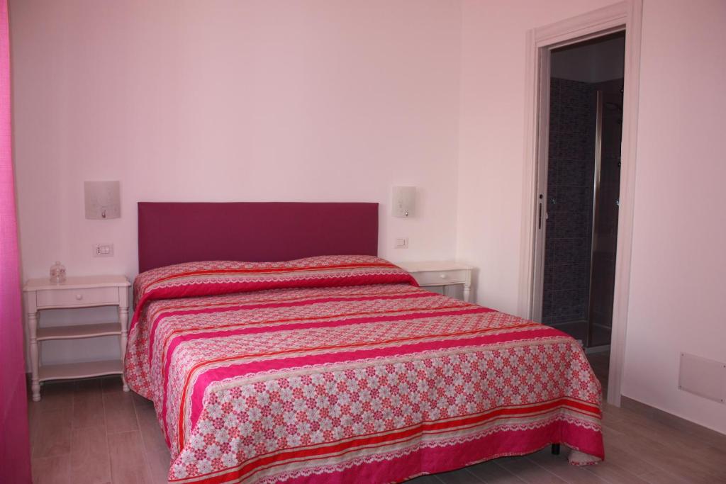 Postel nebo postele na pokoji v ubytování Casa Nova b&b
