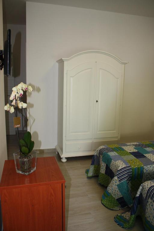 Postel nebo postele na pokoji v ubytování Casa Nova b&b