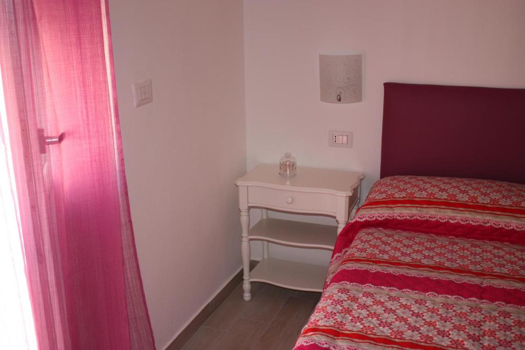 Postel nebo postele na pokoji v ubytování Casa Nova b&b