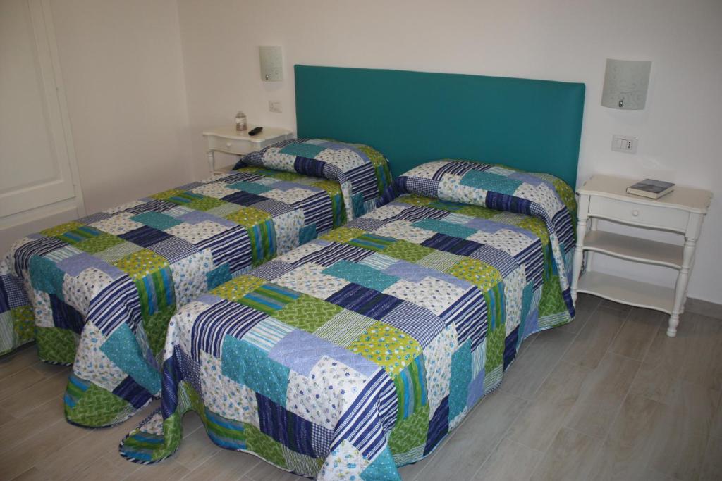 Postel nebo postele na pokoji v ubytování Casa Nova b&b