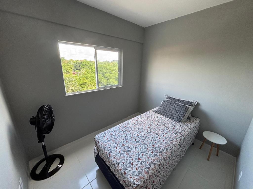 Ένα ή περισσότερα κρεβάτια σε δωμάτιο στο Apartamento Amazônico Completo COP 30