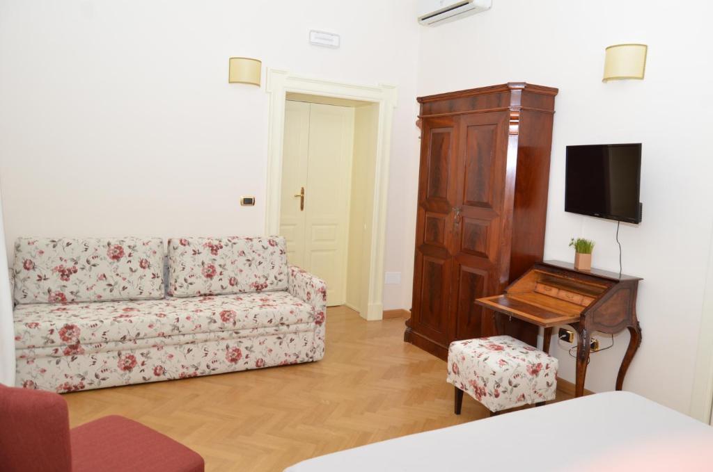 TV a/nebo společenská místnost v ubytování B&B Casa D'alleri