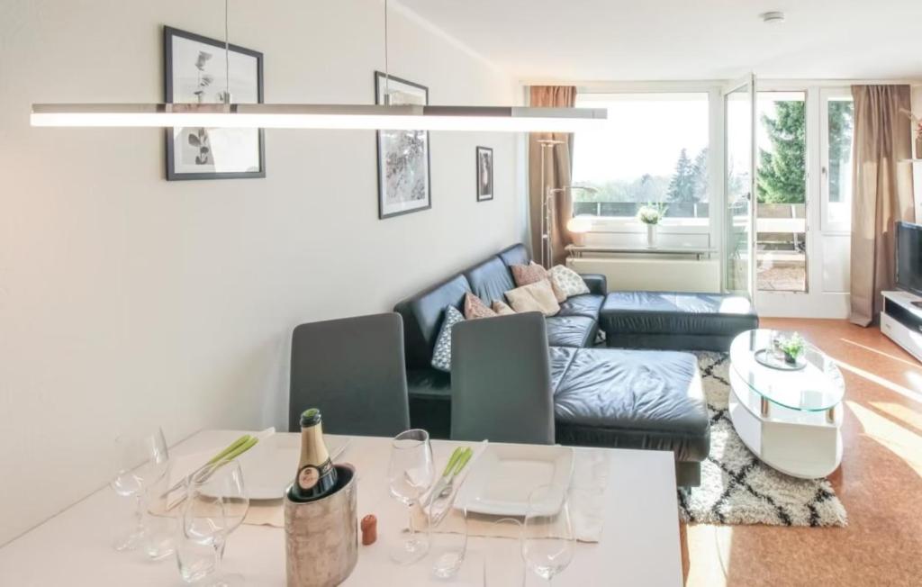 a living room with a couch and a table at Luna & Stella Apartments, Sankt Englmar in Sankt Englmar