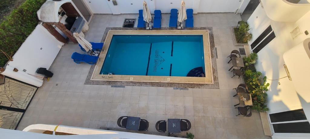 an overhead view of a swimming pool in a building at Luxor Sapphire in Luxor