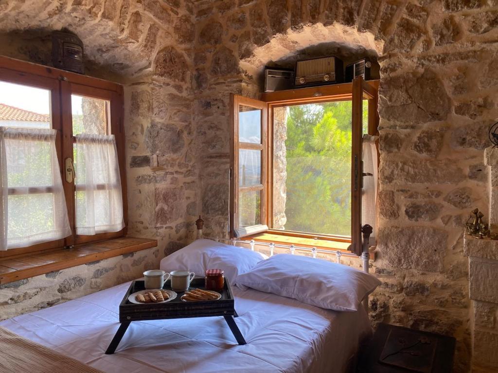 Ένα ή περισσότερα κρεβάτια σε δωμάτιο στο Lithèa House