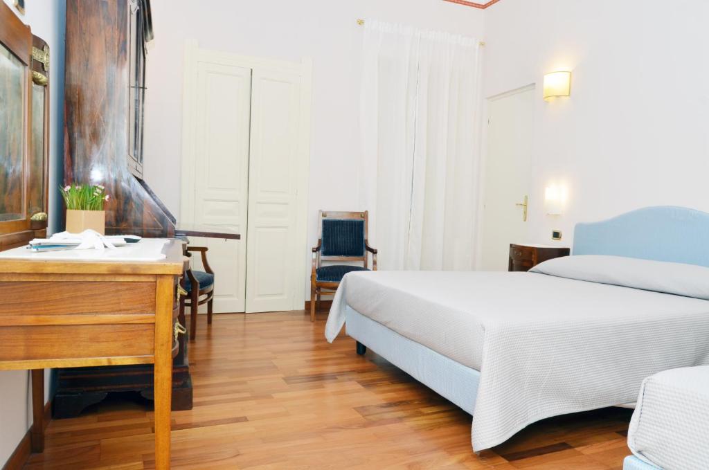 Postel nebo postele na pokoji v ubytování B&B Casa D'alleri