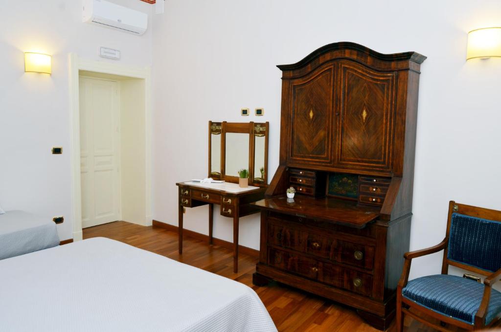 Postel nebo postele na pokoji v ubytování B&B Casa D'alleri