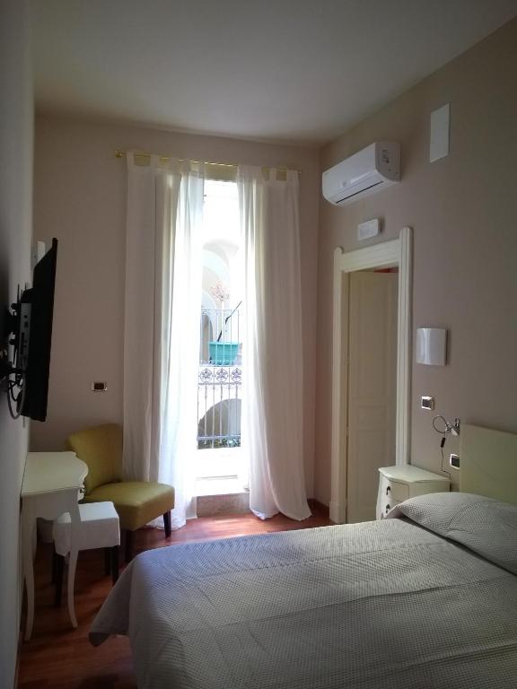 Postel nebo postele na pokoji v ubytování B&B Casa D'alleri