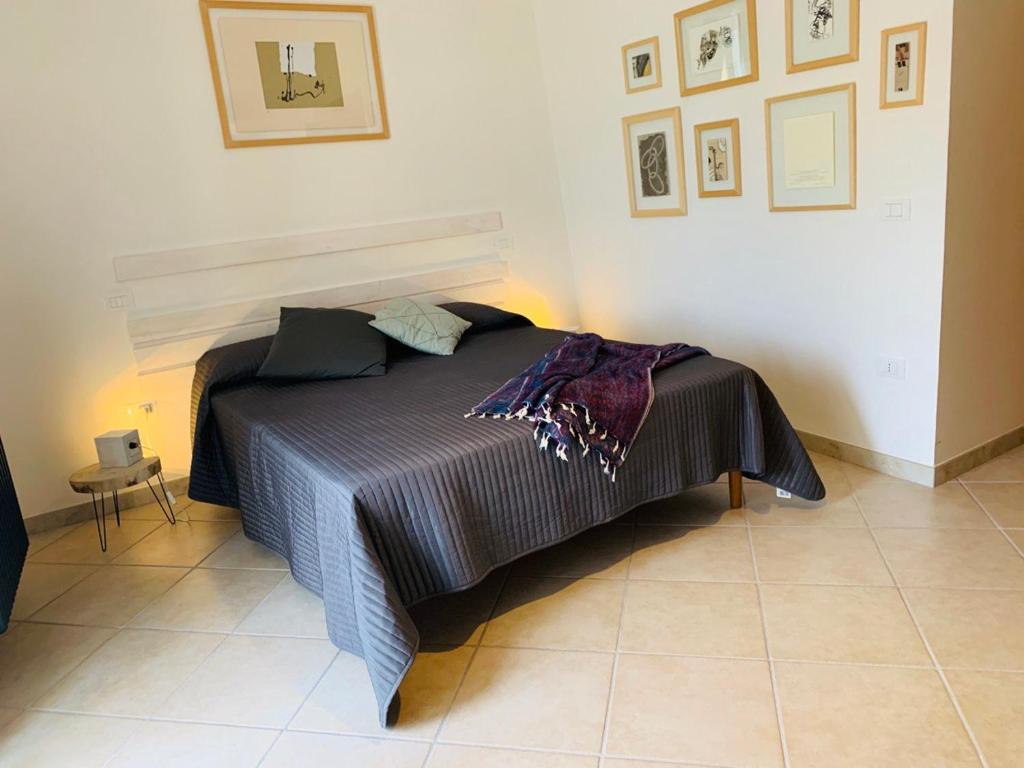 a bedroom with a bed in a room at Casa Di Poeta in Casacalenda