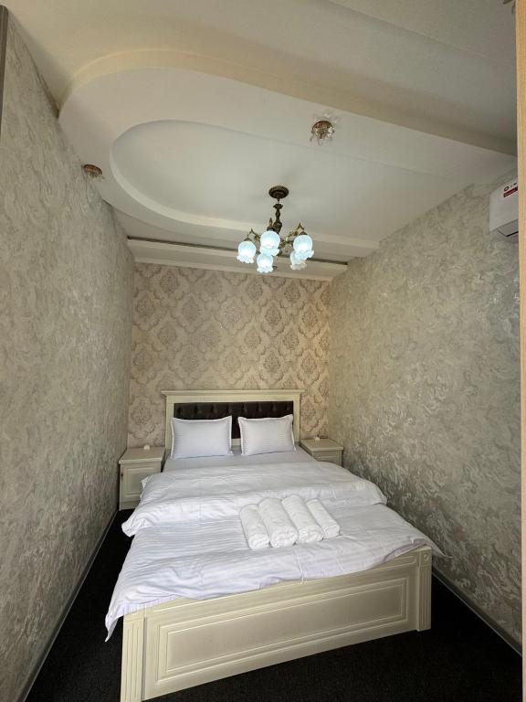 เตียงในห้องที่ Inside Hotel