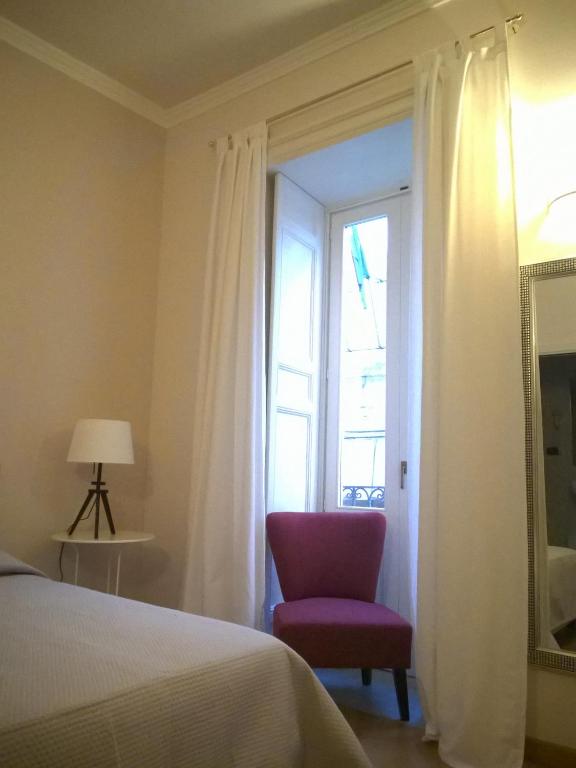 Postel nebo postele na pokoji v ubytování B&B Casa D'alleri
