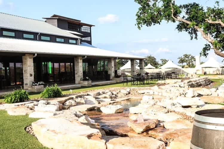 a building with rocks in front of a building at Resort at Fredericksburg Unit 25 in Rocky Hill