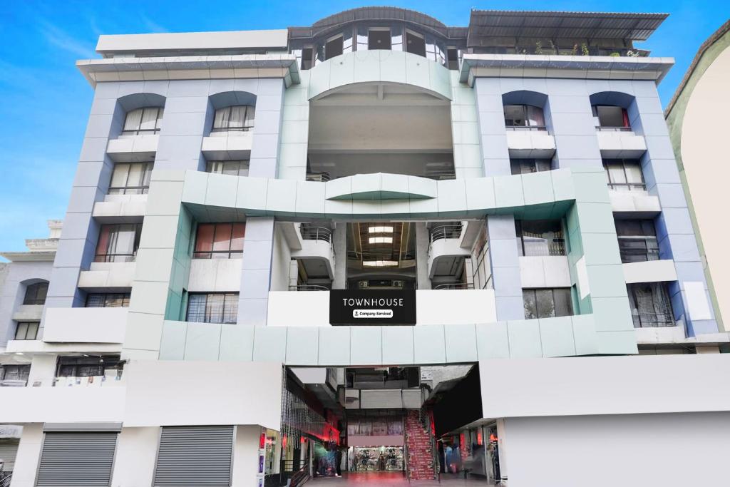 a view of the front of the hotel at Townhouse Margao Near Railway Station Formerly Hotel Tanish in Goa