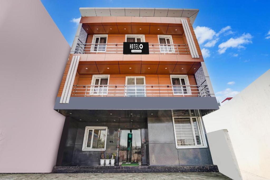 a building with a sign that reads hive at Hotel O Sunrakh Road Vrindavan Formerly Ganga Residency in Vrindāvan