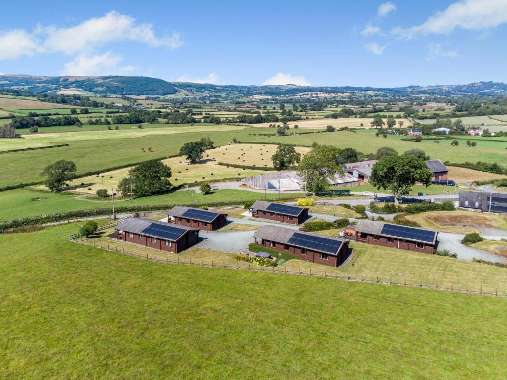 an overhead view of a farm with buildings in a field at 1 Bed in Llandinam oc-t33065 in Llandinam