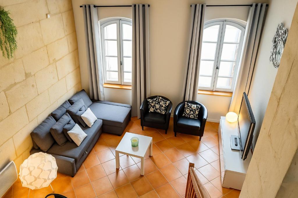 Χώρος καθιστικού στο La Garriguette charmant appartement 4 chambres au cœur d'Arles - calme & climatisé