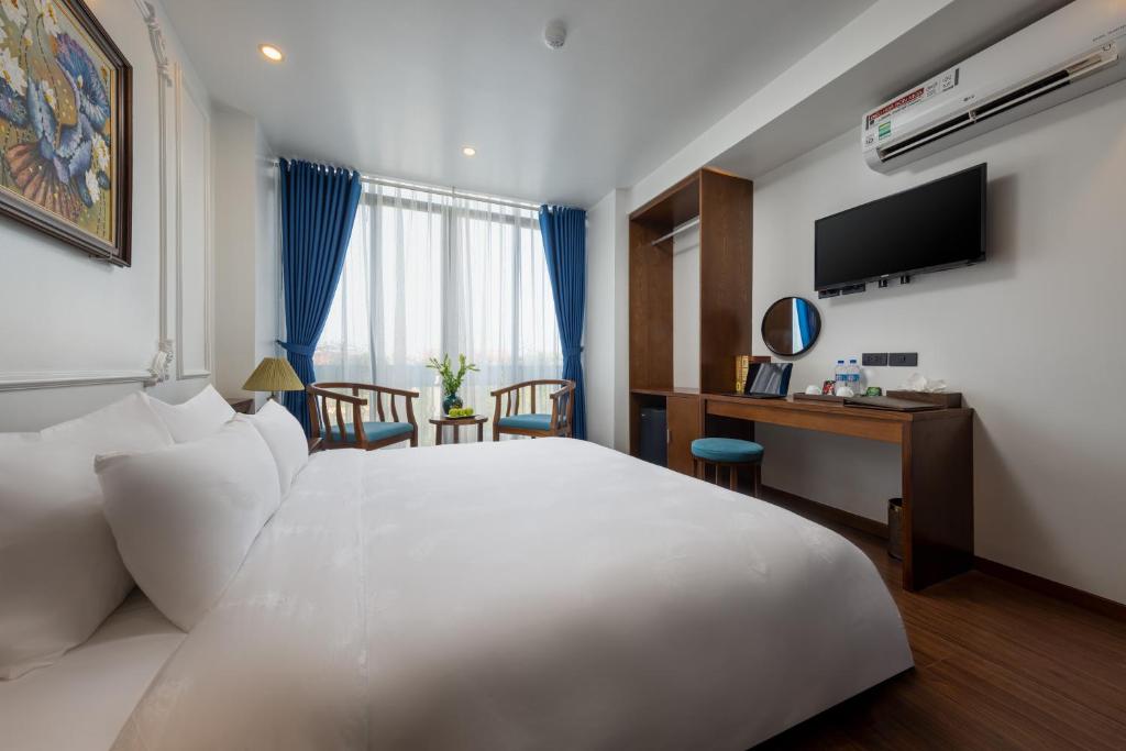 TV a/nebo společenská místnost v ubytování Tam Coc Condelux Boutique Hotel