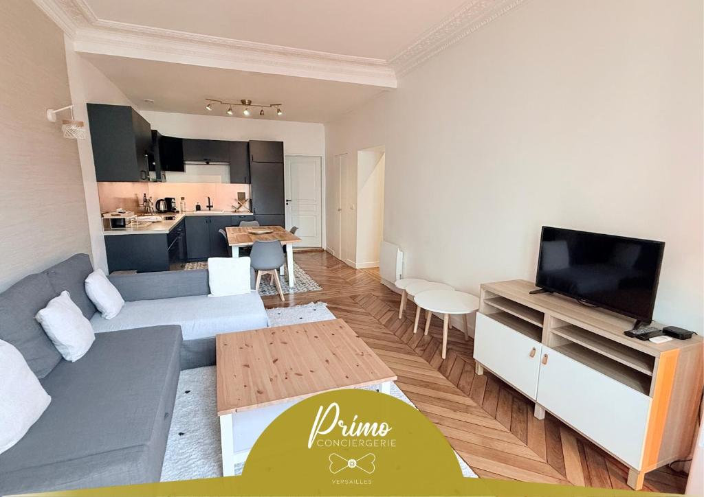 Μια τηλεόραση ή/και κέντρο ψυχαγωγίας στο Le Dangeau Elégance et Modernité proche Château