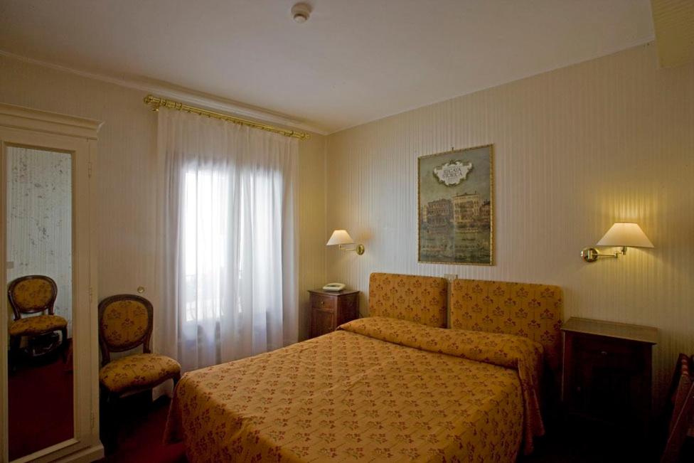 Postel nebo postele na pokoji v ubytování Hotel Agli Alboretti