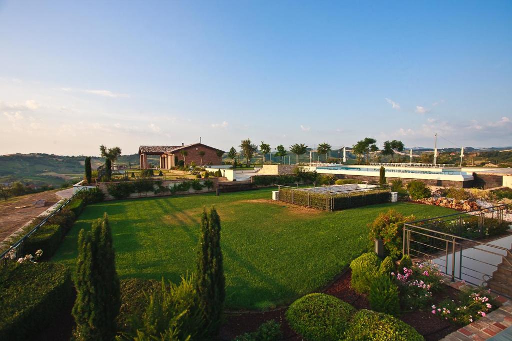 an aerial view of a garden with a house at Le Orchidee Villa in Roncofreddo