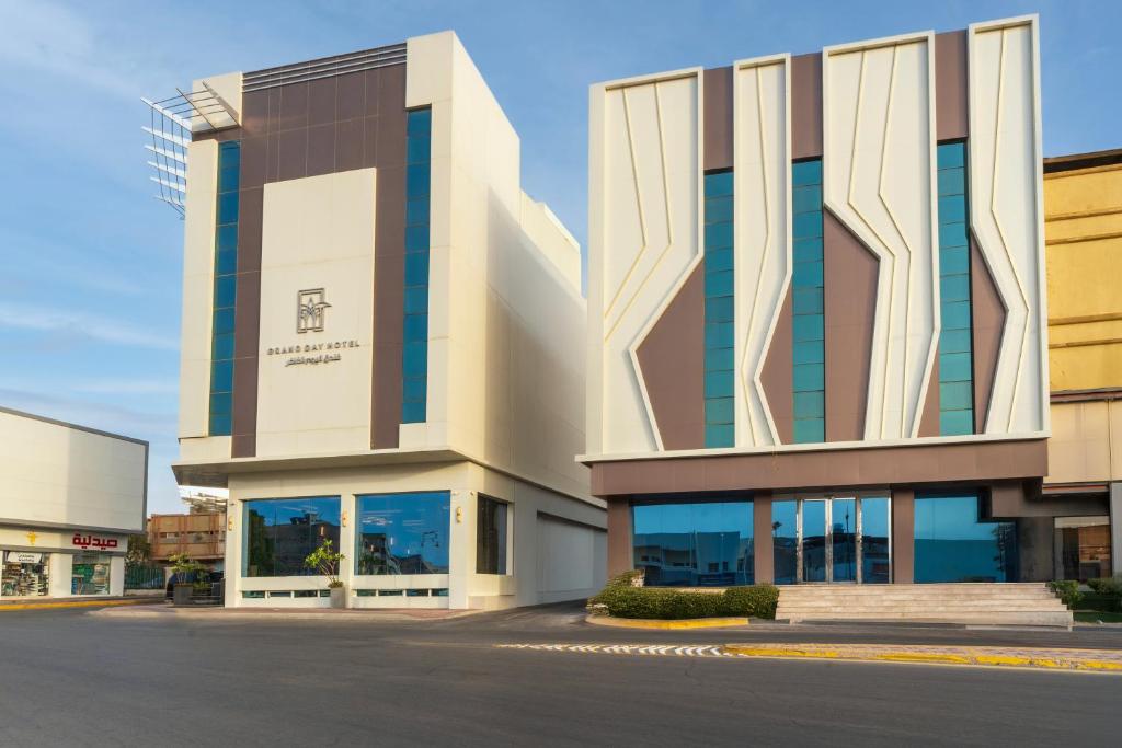 a rendering of a building in a city at Grand Day Hotel Boutique in Al Hofuf