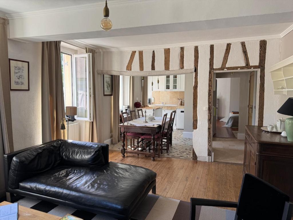 Posezení v ubytování Appartement 1er étage dans maison de maître