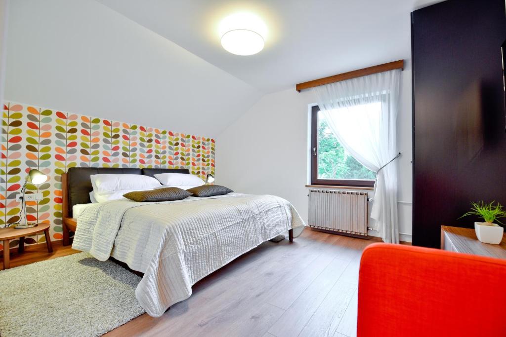 Postel nebo postele na pokoji v ubytování Vila Laura