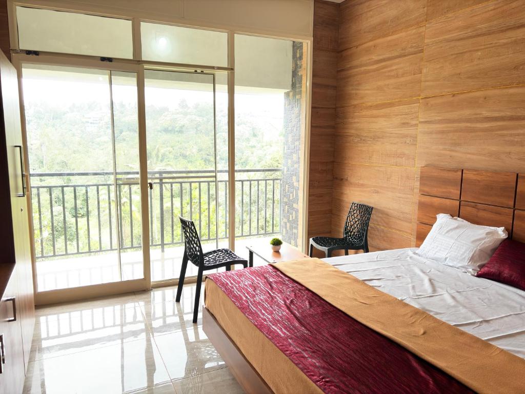 Ένα ή περισσότερα κρεβάτια σε δωμάτιο στο Cozy meadows homestays