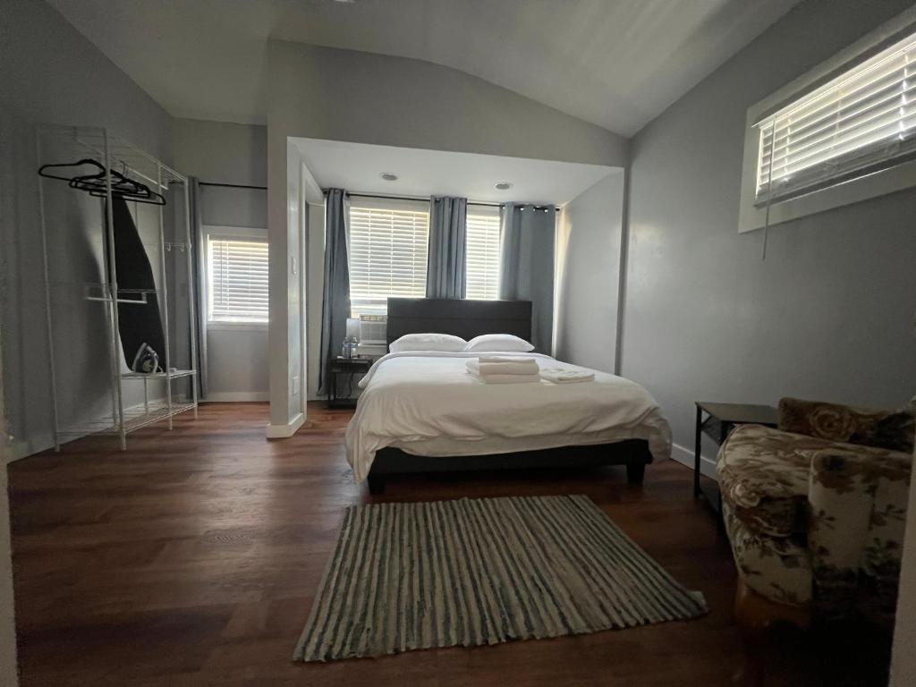 Ένα ή περισσότερα κρεβάτια σε δωμάτιο στο Stay with Jay - Quinta Suite