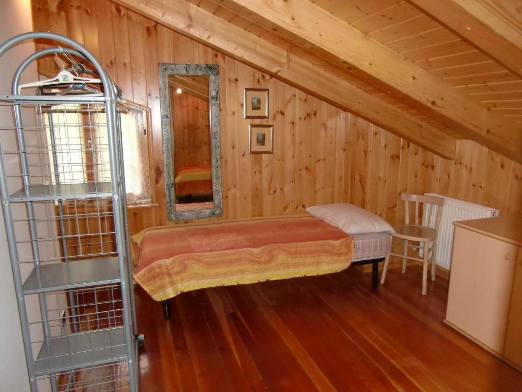 Postel nebo postele na pokoji v ubytování Casa Pippi
