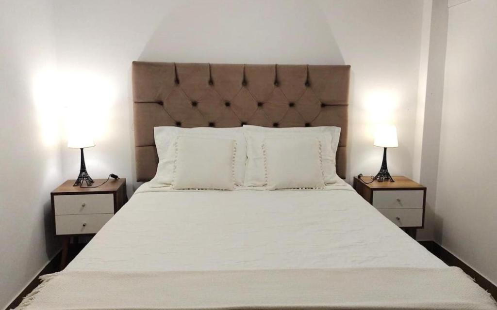 Postel nebo postele na pokoji v ubytování APARTAMENTOS PRIVADOS Lima Airport Perú