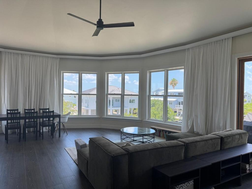 a living room with a couch and a table at Il Capitano - Little Torch Key in Little Torch Key