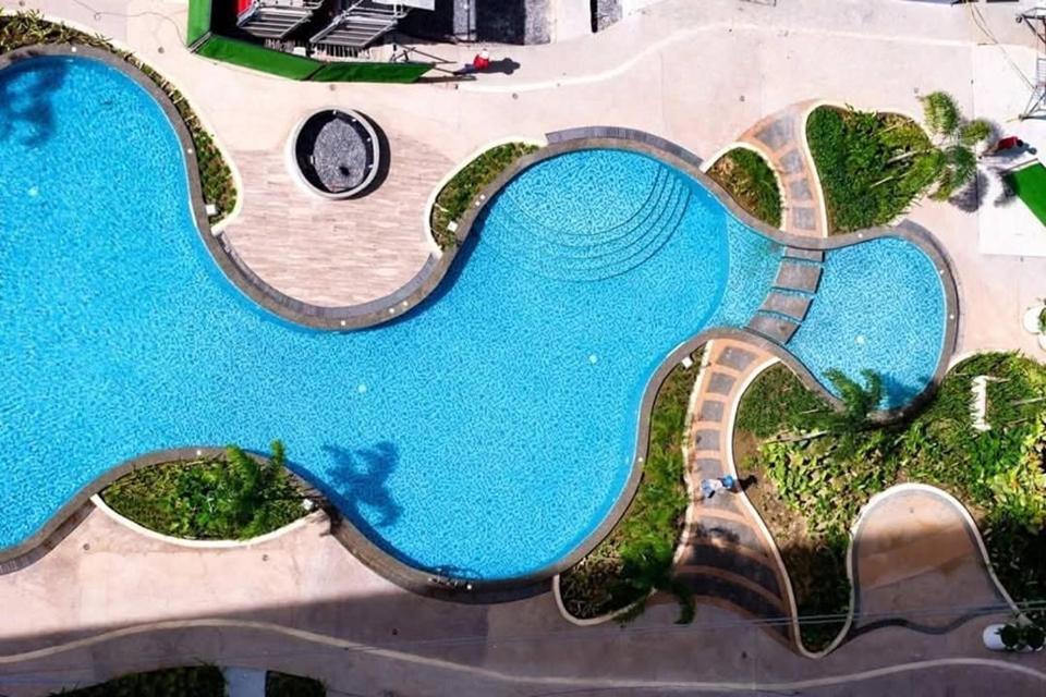 an overhead view of a swimming pool at Casa Amalia by Casa Mira Mandaue in Mandaue City