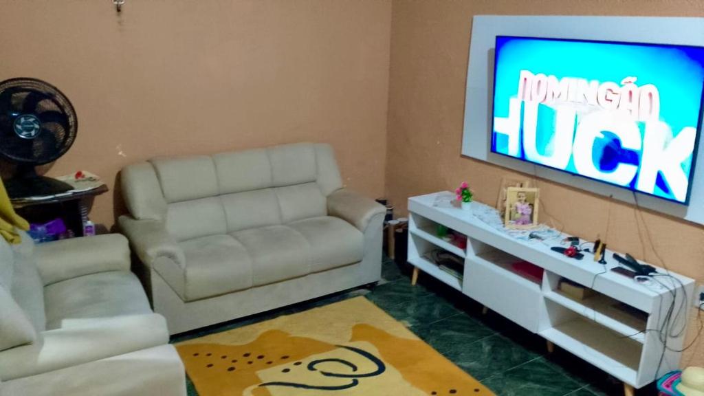 Μια τηλεόραση ή/και κέντρο ψυχαγωγίας στο Casa primeiro andar