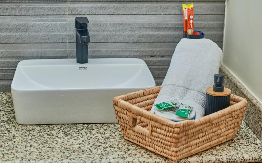 a basket on a counter next to a toaster at Lavish Luxury Homes in Tengeru