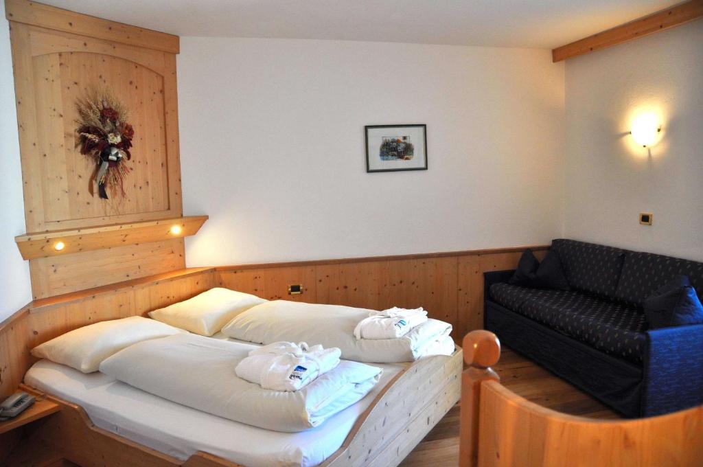 Postel nebo postele na pokoji v ubytování Hotel Teresa