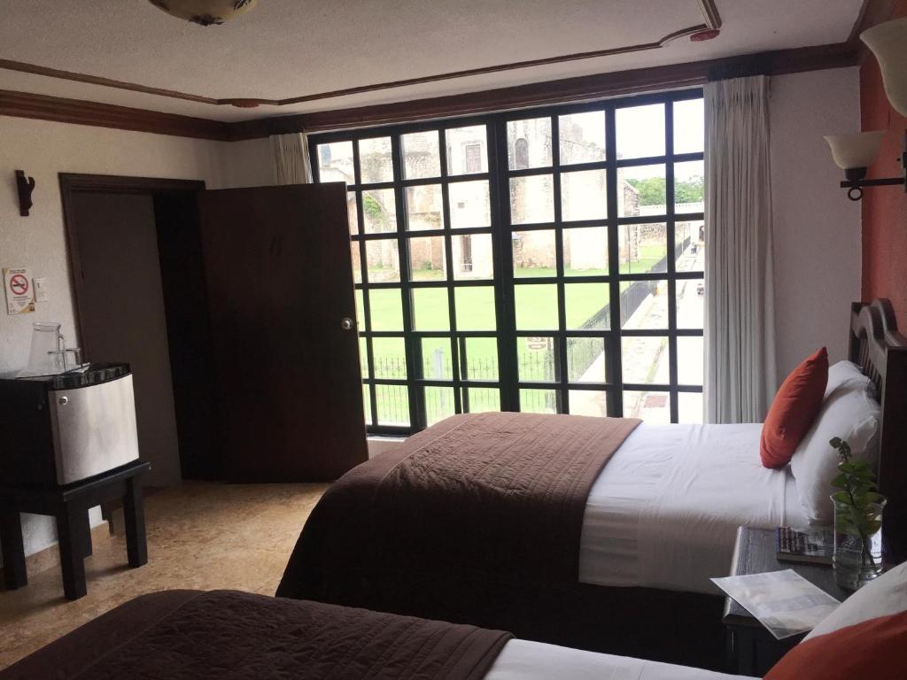 Postel nebo postele na pokoji v ubytování Hotel Rinconada del Convento