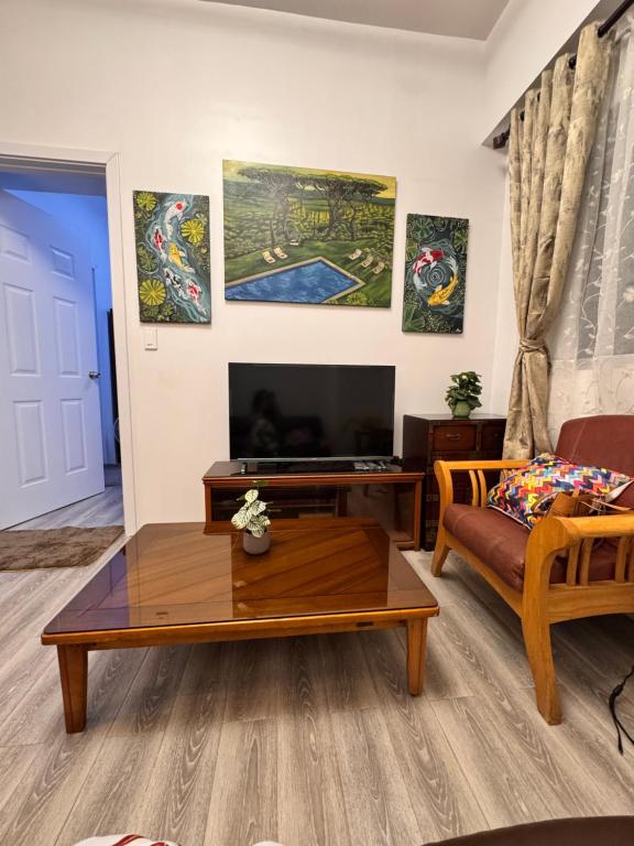 TV/trung tâm giải trí tại Amani Grand Resort Residences Building C Unit 118