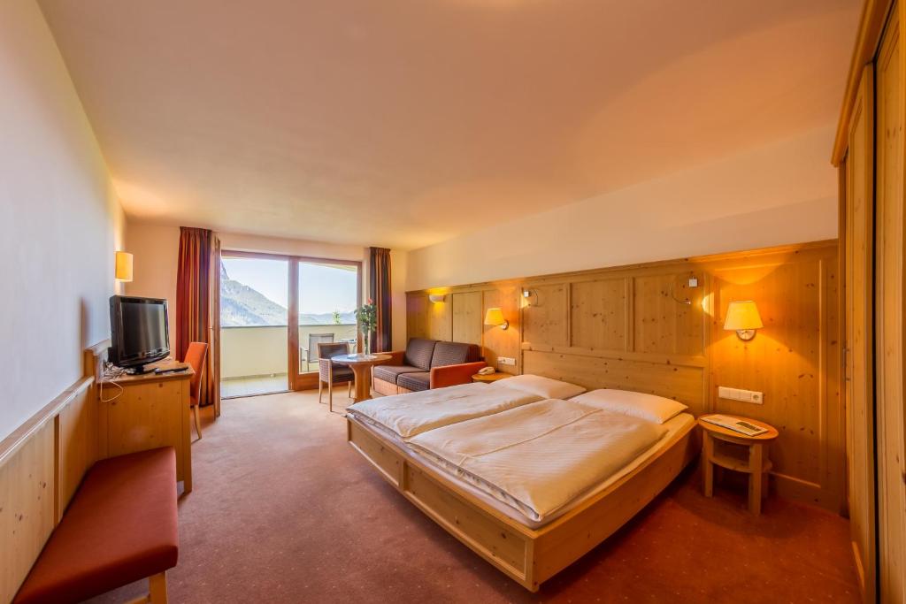 Łóżko lub łóżka w pokoju w obiekcie Hotel Plunger