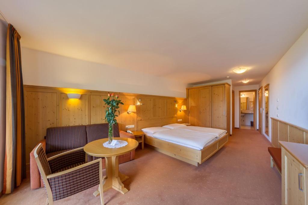 Łóżko lub łóżka w pokoju w obiekcie Hotel Plunger