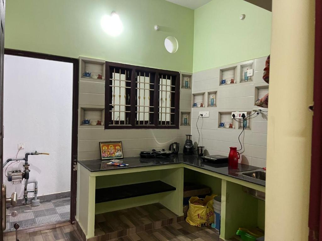 Η κουζίνα ή μικρή κουζίνα στο Elanza Villa