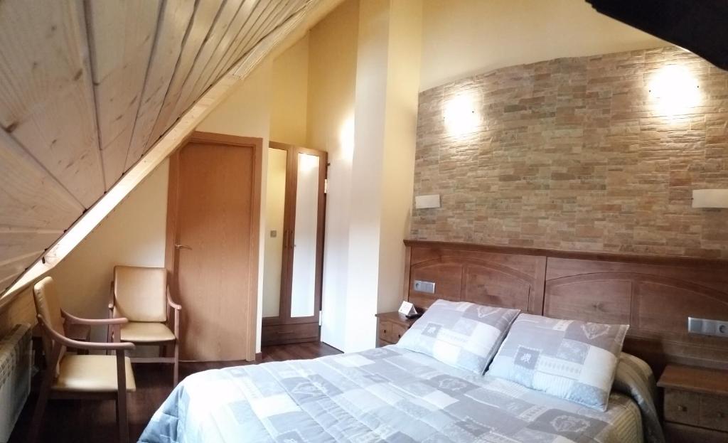 Postel nebo postele na pokoji v ubytování Hotel Sarao