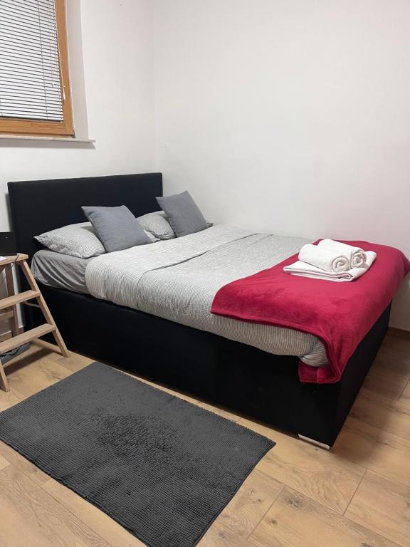 Postel nebo postele na pokoji v ubytování Urko Apartments Ljubljana