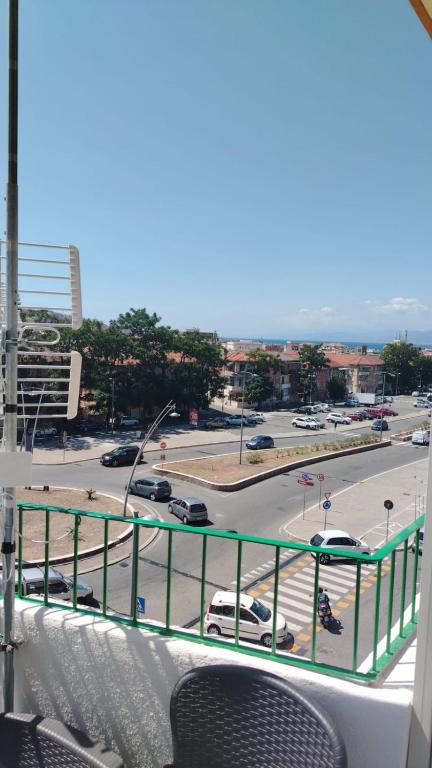 a balcony with a view of a parking lot at Casa Vacanze Giada in Reggio Calabria
