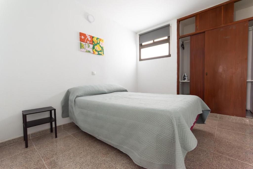 En eller flere senge i et værelse på Family Vacation 2 Bedrooms