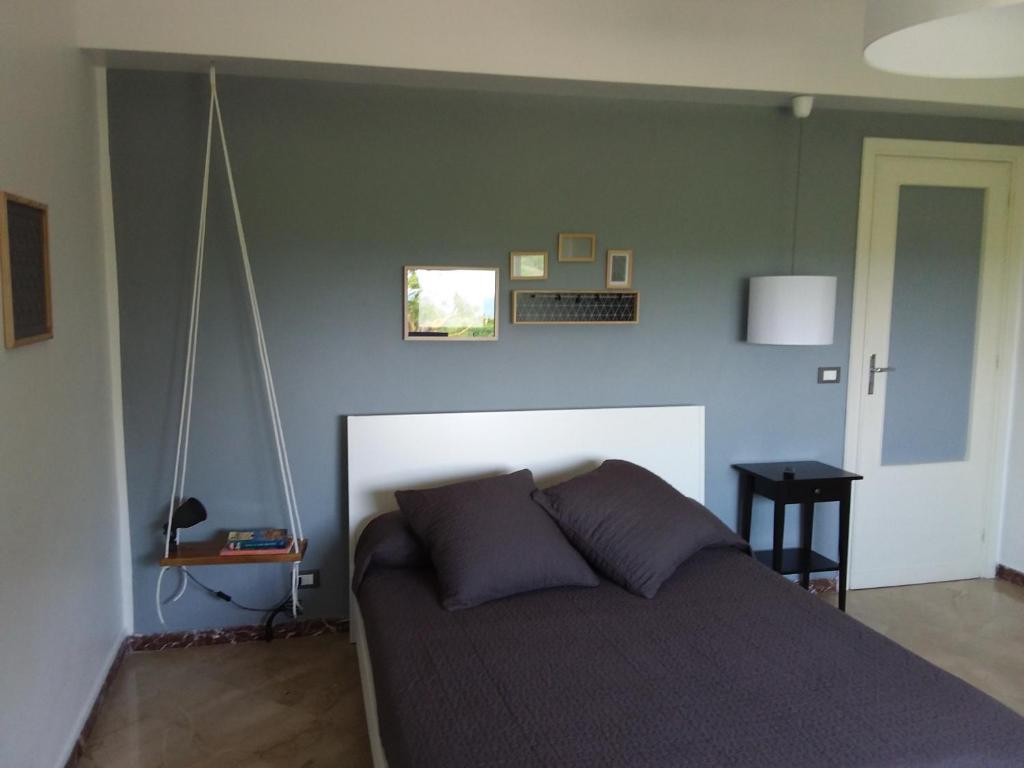 A bed or beds in a room at Porta Nuova