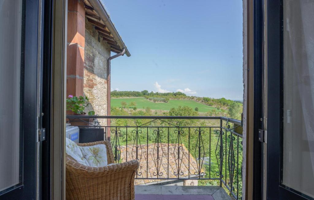 an open door to a balcony with a view at Stunning Apartment In Ville Di Corsano in Corsano