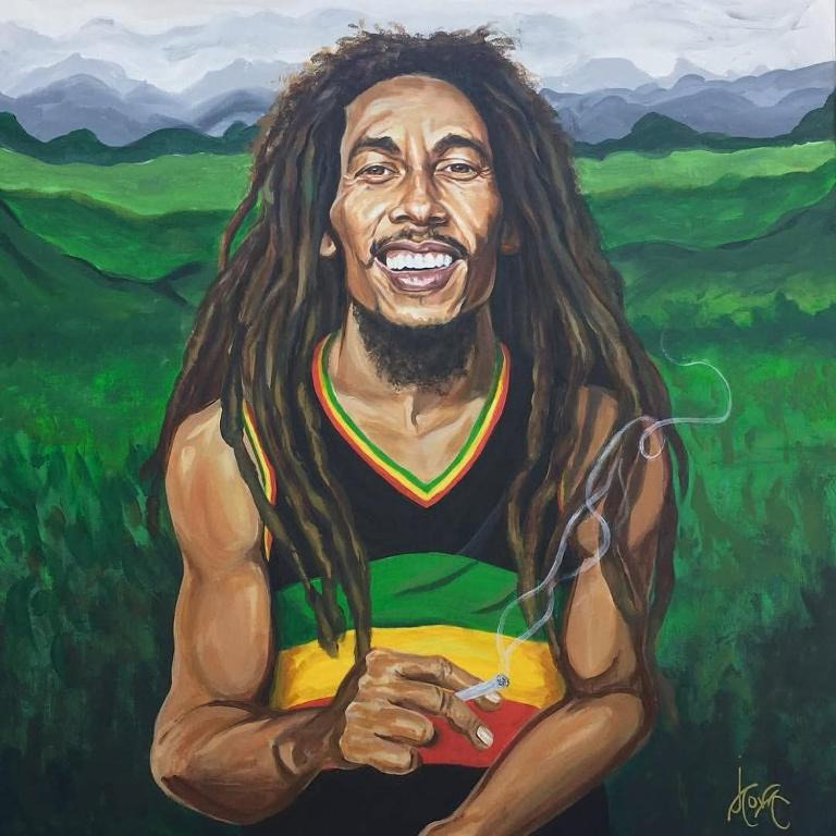 a painting of a man with long hair at Kayan Guest House in Aswan