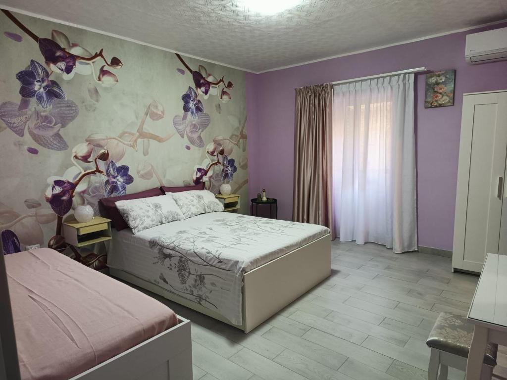 Postel nebo postele na pokoji v ubytování Il sentiero delle fate
